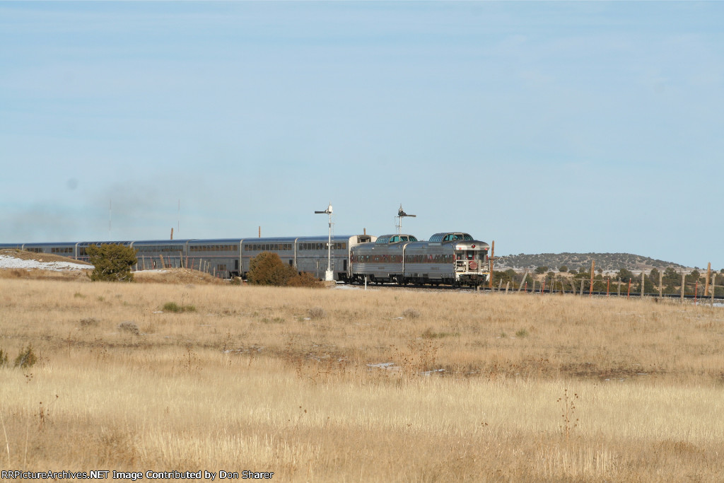 Private cars Puget Sound and Sierra Hotel on the eastbound Southwest Chief split the semaphore 